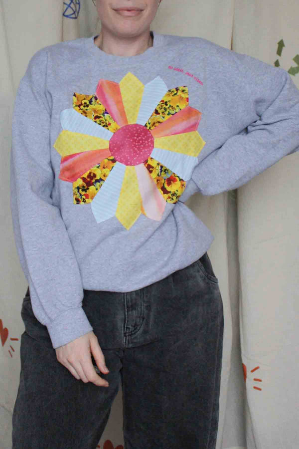 pinwheel quilted motif, upcycled sweater