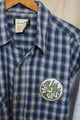 plaid shirt with sweater sleevers, no labels just vibes patch, upcycled clothing