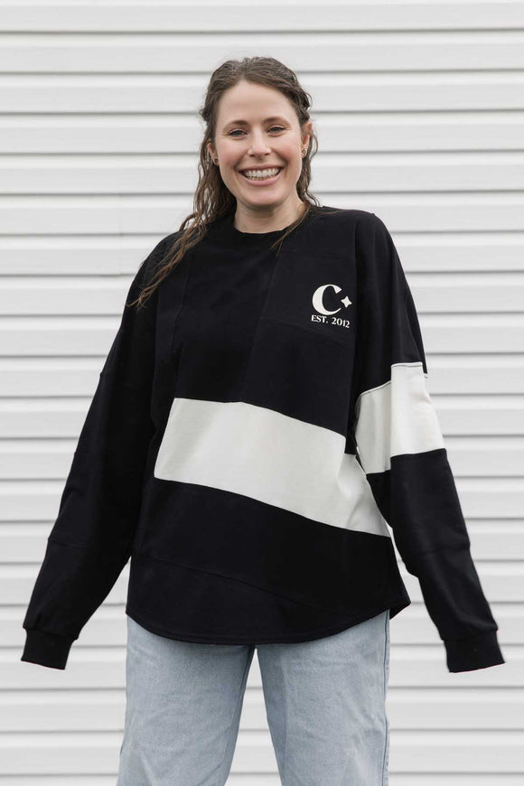 black long sleeve, featuring flahes of cream, made with scrap fabric, handmade in canada