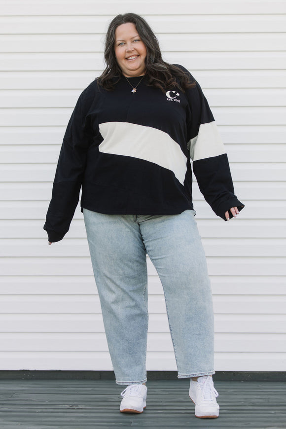 black long sleeve, featuring flahes of cream, made with scrap fabric, handmade in canada