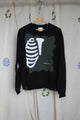upcycled black crew with skeleton ribcage and arm bones, repurposed in canada