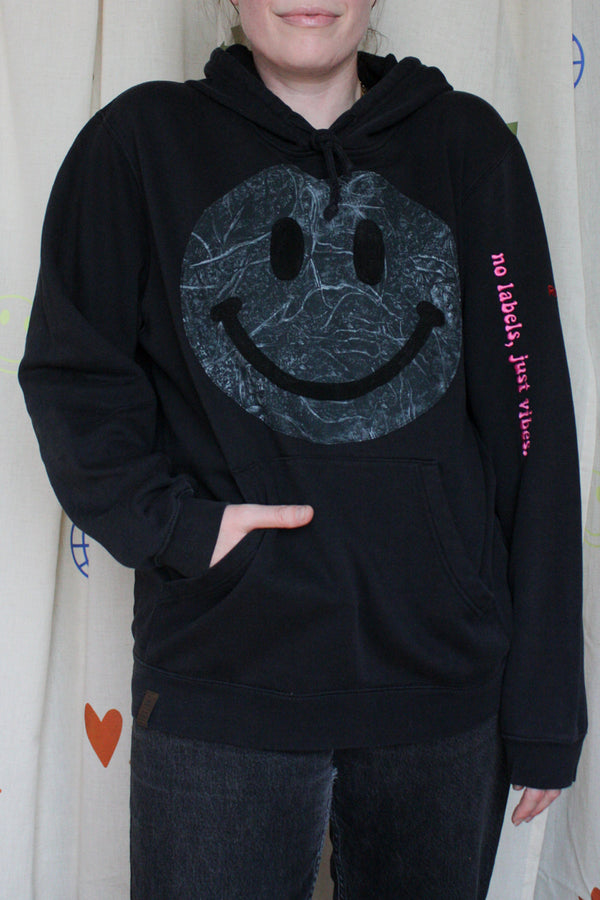 smiley face sweater, upcycled clothing, repurposed fabric, embroidered with no labels, just vibes
