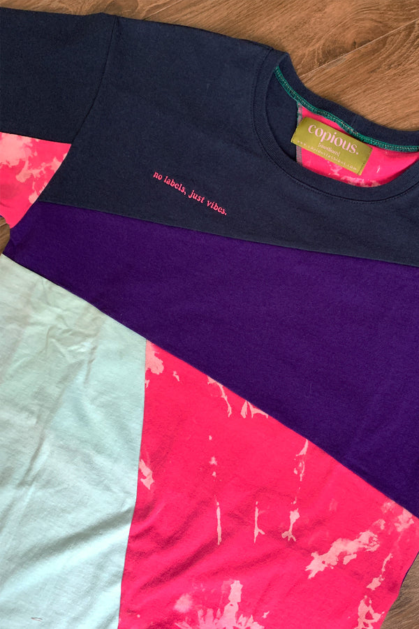 navy, purple, pink and teal upcycled and repurposed in canada, featuring st. thomas image in the back
