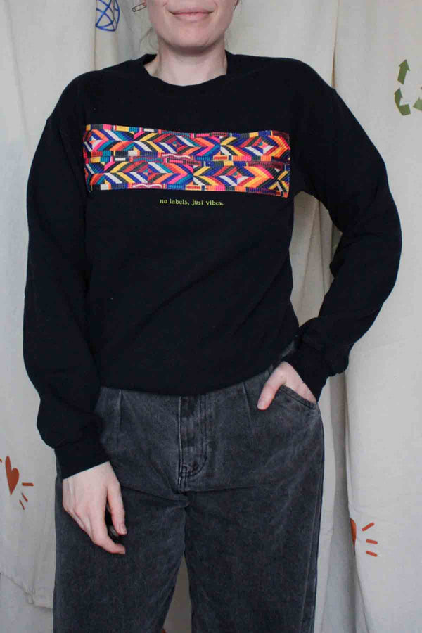 black sweater with colour strap detail, upcycled sweater