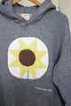grey hoodie with sunflower motif, covering logo, repurposed clothing, upcycled, one of a kind, no labels, just vibes