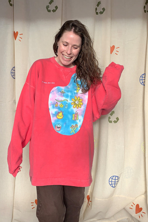 pink upcycled sweater with tie dyed front featuring cute drawings, repurposed in canada