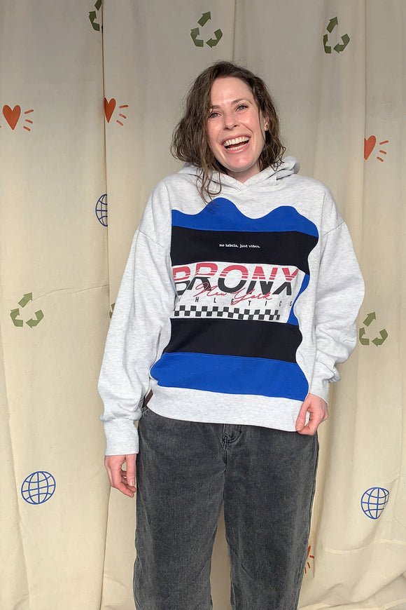 grey hoodie featuring bronx new york logo and blue and black colours, upcycled in canada