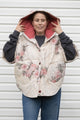 rose comforter upcycled into clare poncho, designed to be layered with all your fall outfits. made in canada