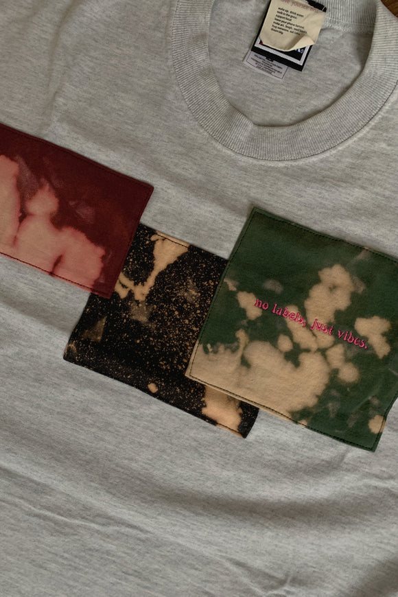 grey tee with bleached patches, upcycled and repurposed in canada