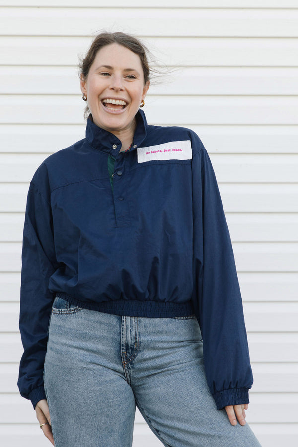 navy pullover windbreaker with quilting detail both front and back, upcycled in canada