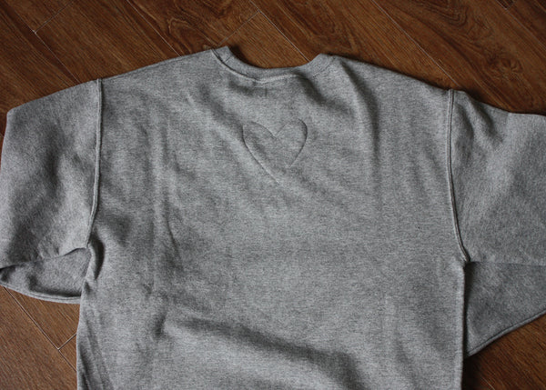navy lace heart, white sweater, athletic sweater, hand stitched in Ottawa