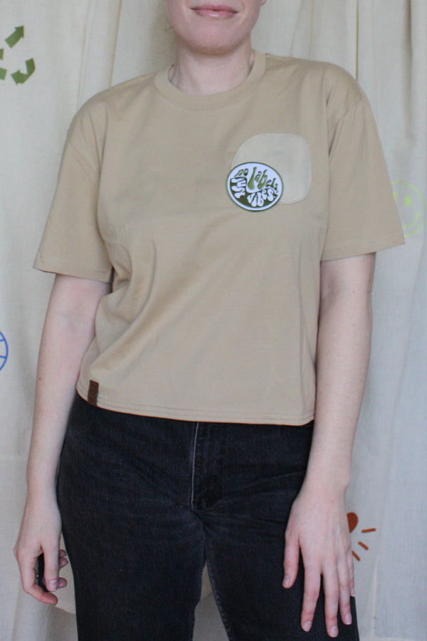 beige crop top, no labels just vibes patch, secondhand and upcycled clothing
