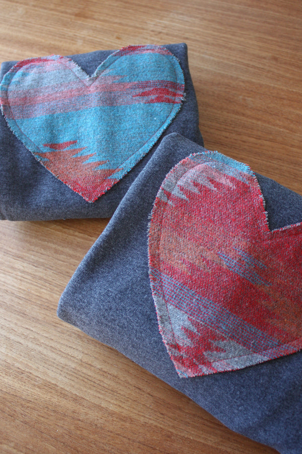 red and blue heart sweater, cut from scrap fabric. upcycled oversized sweater, hand stitched in ottawa