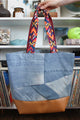 light wash denim carryall, denim scrap fabric, upcycled denim, handmade in Ottawa, faux leather and colourful straps