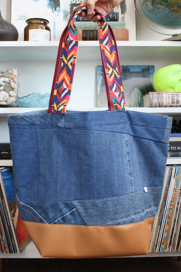 medium wash denim carryall, denim scrap fabric, upcycled denim, handmade in Ottawa, faux leather and colourful straps