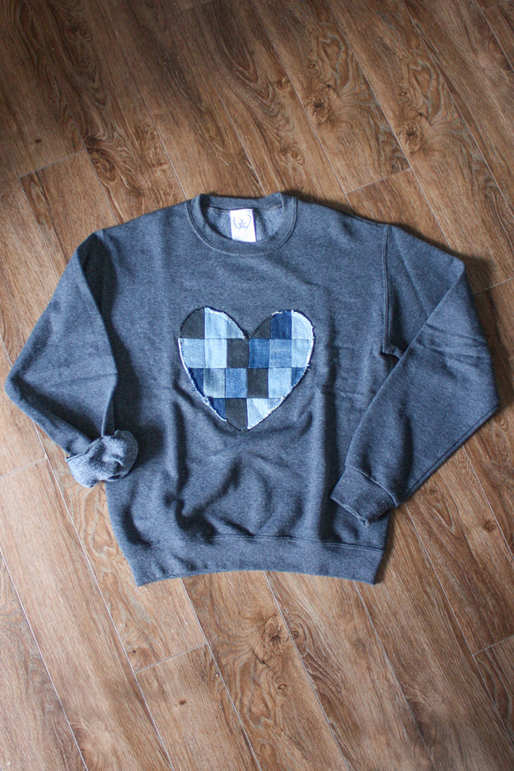 denim patchwork heart, charcoal sweater, scrap fabric, eco-friendly, hand stitched in Ottawa