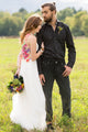 woman wearing an alternative wedding gown, white bodice with colourful floral lace in the back. cirnoline skirt, made in canada